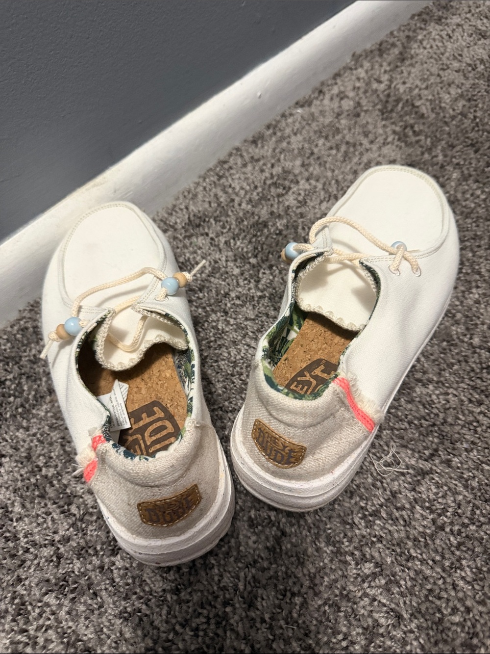 Hey Dude Women's White Slip-On Sneakers with Coral Accent